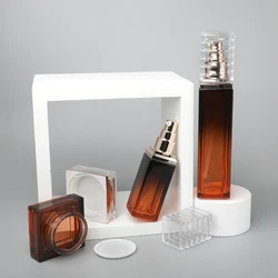 factory wholesale high quality Skincare Packing Set Amber Cosmetic Face Cream Jar Square Glass Body Lotion Bottle with Gold Pump