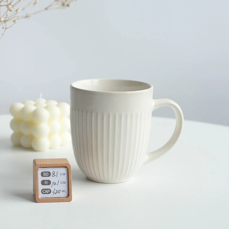 Manufacturer supply embossed ceramic coffee mugs custom logo pattern color porcelain cup