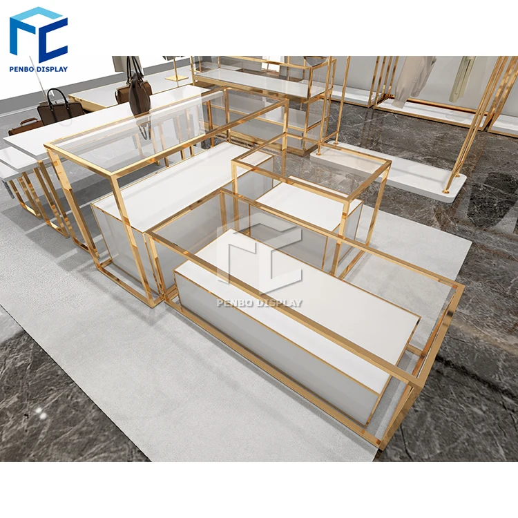 Gold clothing rack apparel retail nesting table clothes shelving garment display rack clothing store furniture
