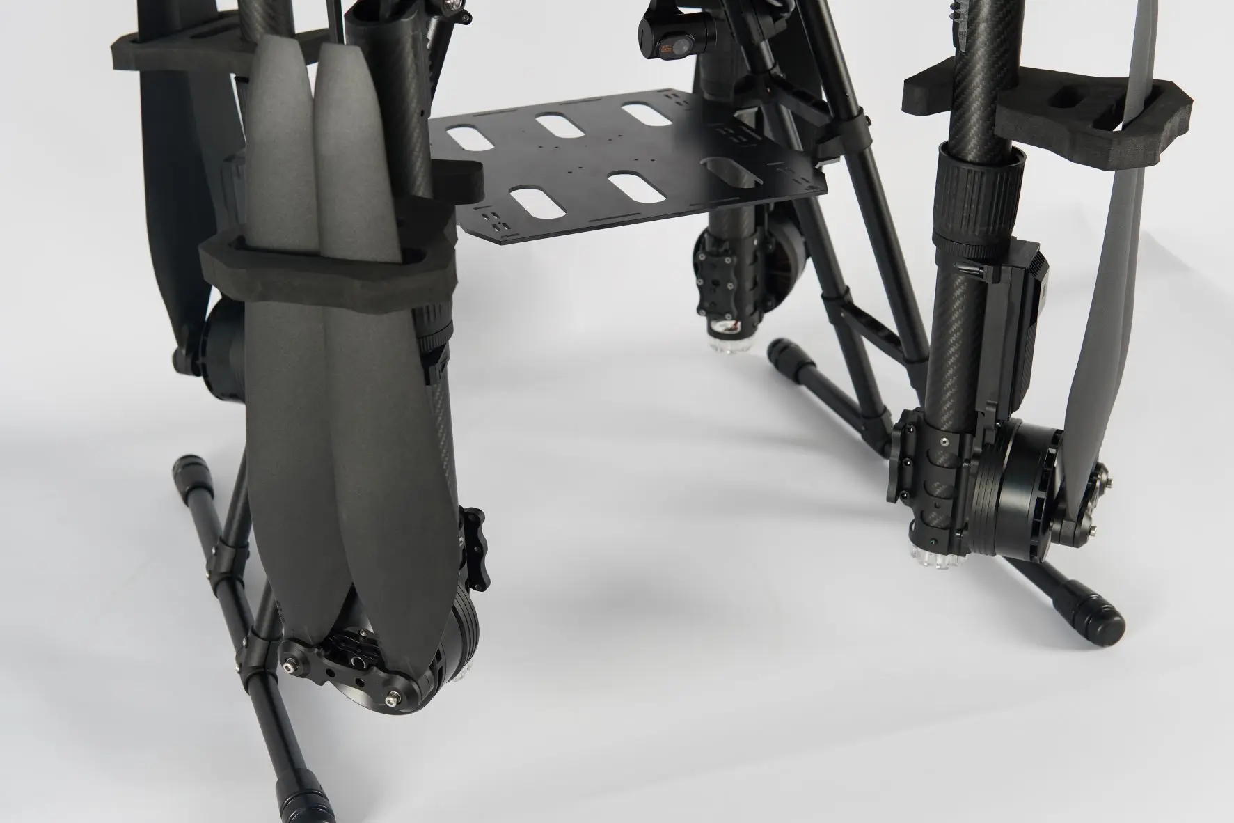 One-piece injection molding, arm-wrapped molding structural materials aerial delivery and transportation UAV