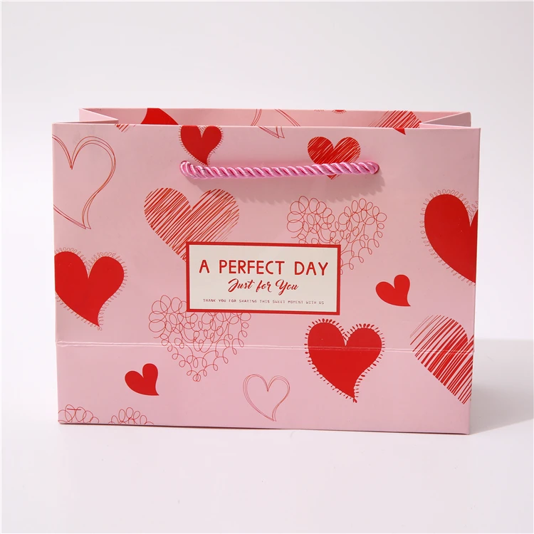 Gonhua Wholesale Luxury Gold Foil Pink Kraft Packing Paper Bag With Ribbons Custom Logo Gift Printed Shopping Bag