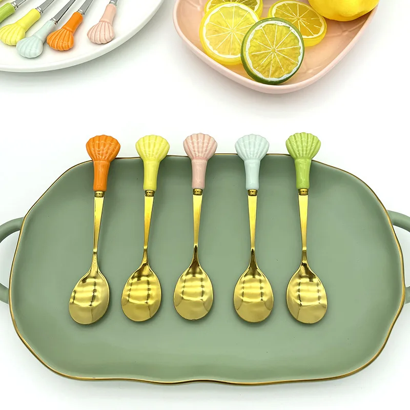 Creativity New Arrival Top Sale Product Stainless Steel Flatware Spooon And Fork Cutlery Set With Ceramic Shell Shape Handle