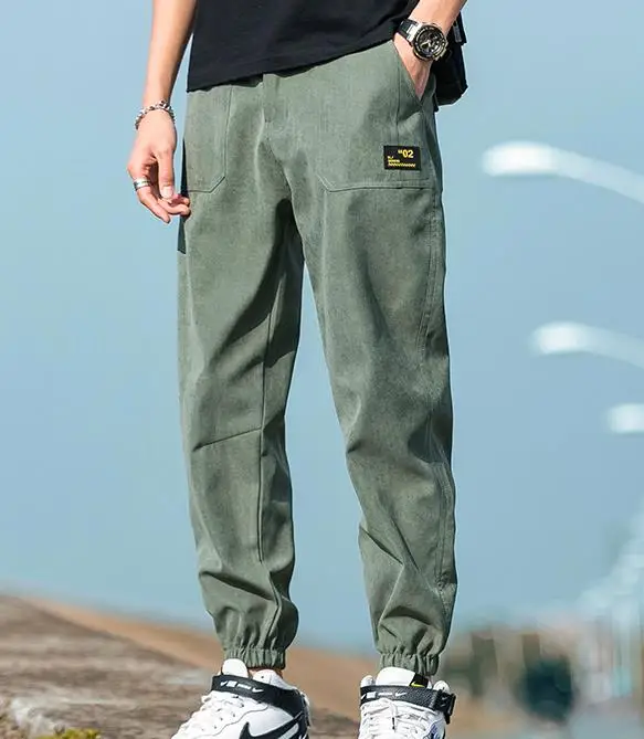 
2020 Autumn/winter plus fleecy pants for men loose-fitting sport long pants with thickening and large size corset overalls for m 