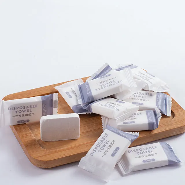 wholesale candy package portable hotel travel magic disposable hair mini compressed facial towel