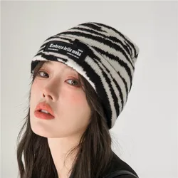 Update fashion hot-sale pure color direct selling warm windproof knitted hat for winter