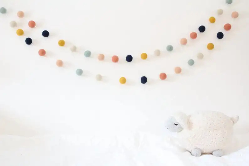 
handmade wool felt ball garland by sheep 