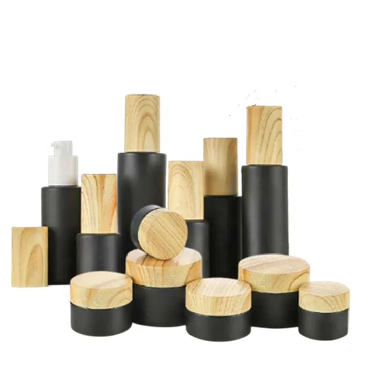 Trade assurance empty matte black glass cream jars and lotion bottles packaging cosmetic sets with bamboo pattern lid