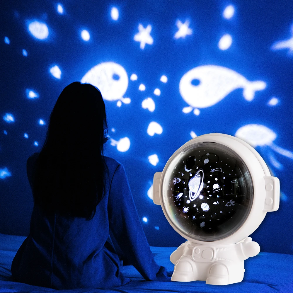 Newest Wholesale Price Light up Moon Decorative Kids Starry Projector Astronaut Night Light with Music Box