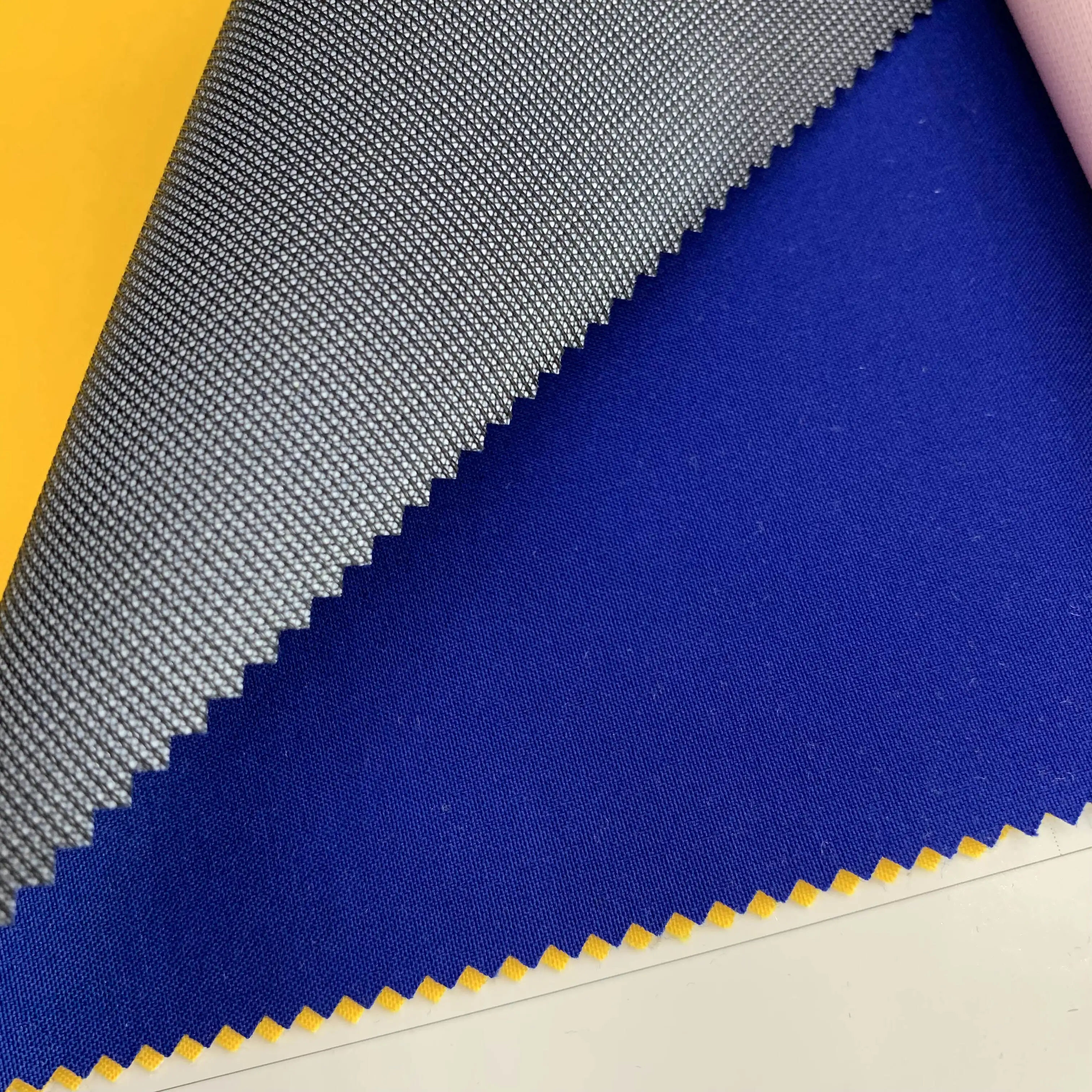 wholesale in stock TPU Membrane laminated bonded knit 3 layers strength Softshell 75D pongee fabric for outdoor coat