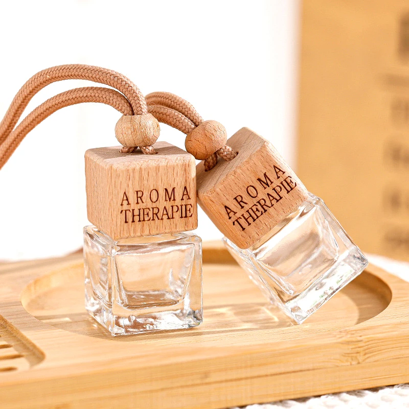 Wholesale 8ml air freshener diffuser empty frosted car hanging perfume bottle with wooden cap