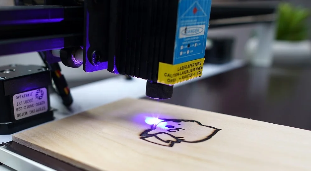 Laser engraving machine that can write and draw the latest model in 2022 Can draw and cut mini robots
