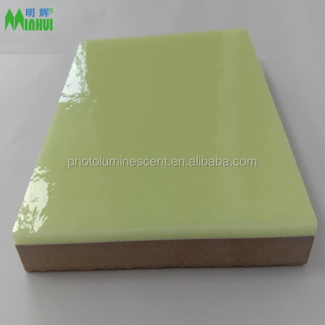Photoluminescent ceramic tile