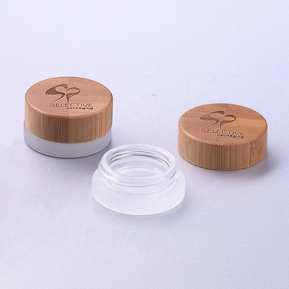 Empty frosted cosmetic glass jar with real bamboo cap