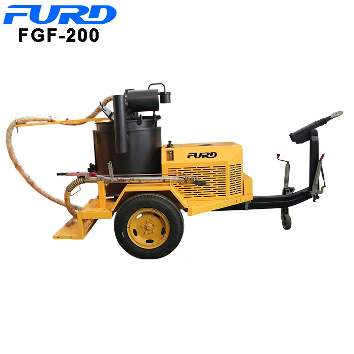 Hot pour sealing machine for asphalt and concrete cracks