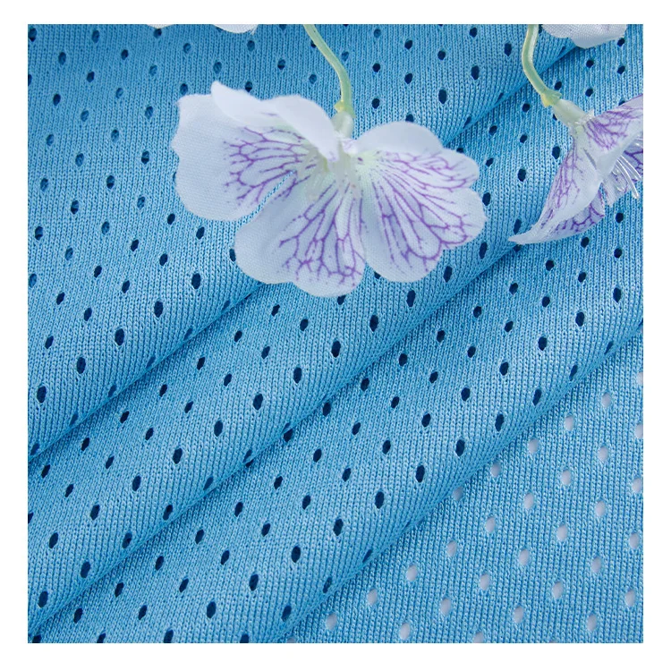 Polyester knitted fabric 100D bullet low spring mesh hole fabric 160g quick drying basketball clothing hip-hop clothing fabric