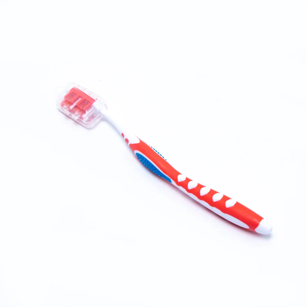 Innovative manual fat handle gum massage feature adult toothbrush with silicone