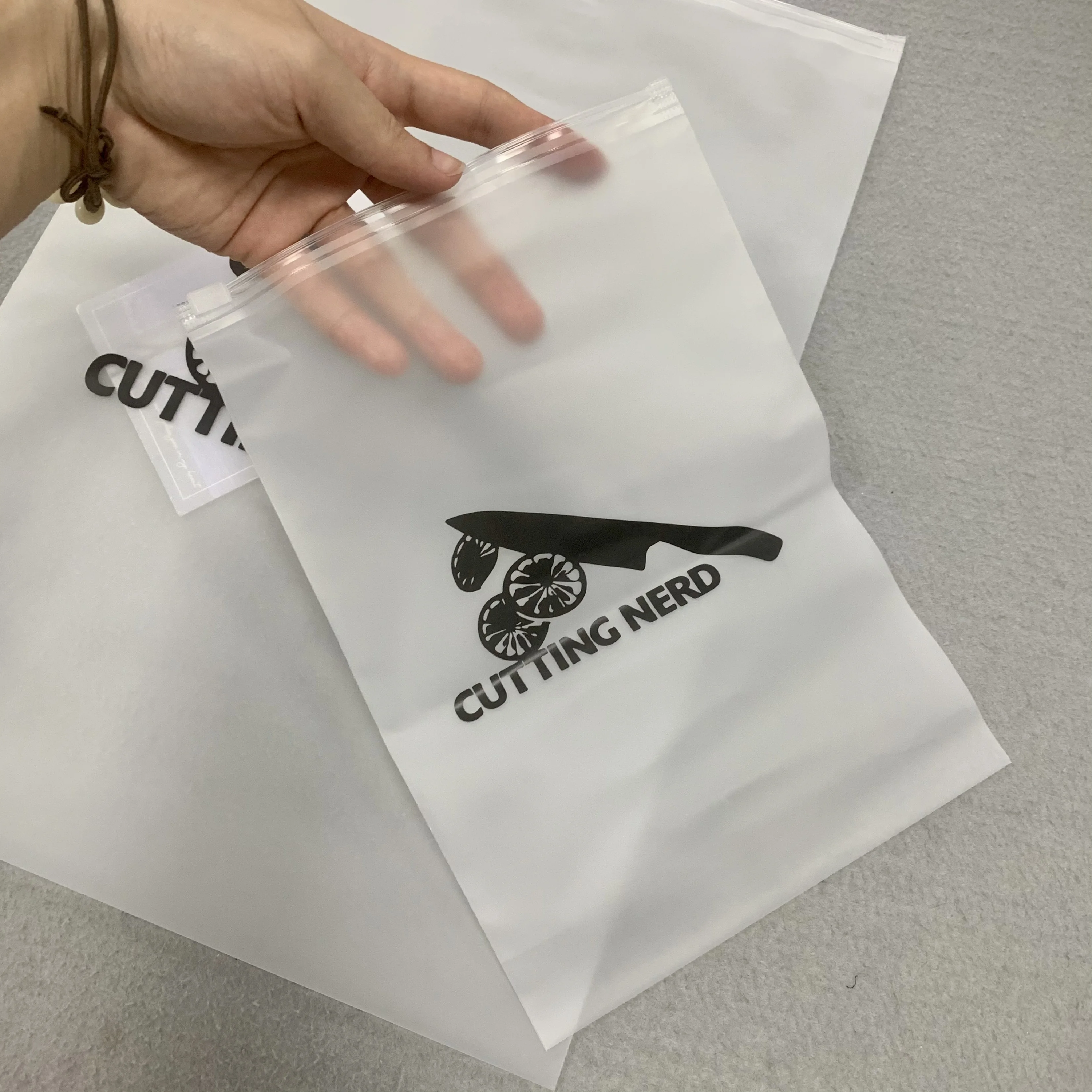 Wholesale evening dresses custom clothing frosted zipper bags custom zipper bag sock packaging ziplock bag