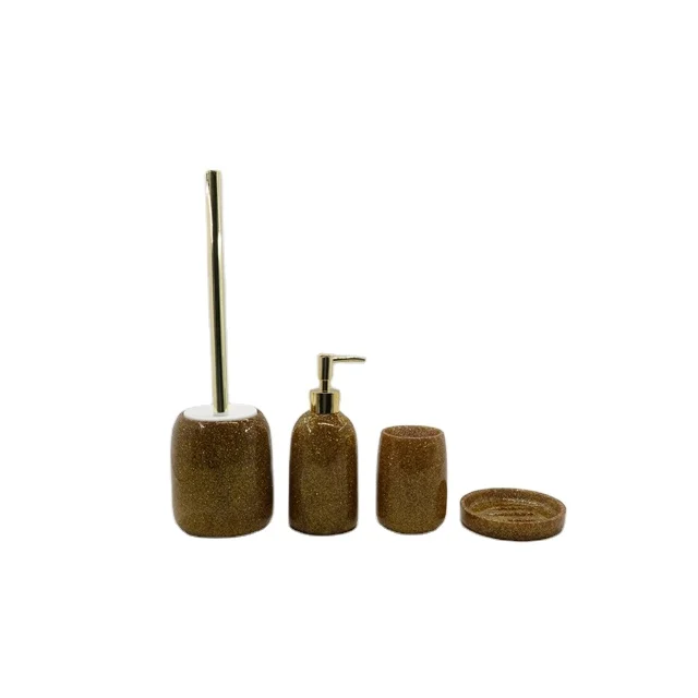 transparent polyresin accessory with shimmering powder shinny gold bathroom accessory