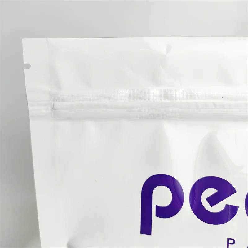 China supplier aluminum foil plastic stand up ziplock packaging bag for 25 pair of hand/foot care socks