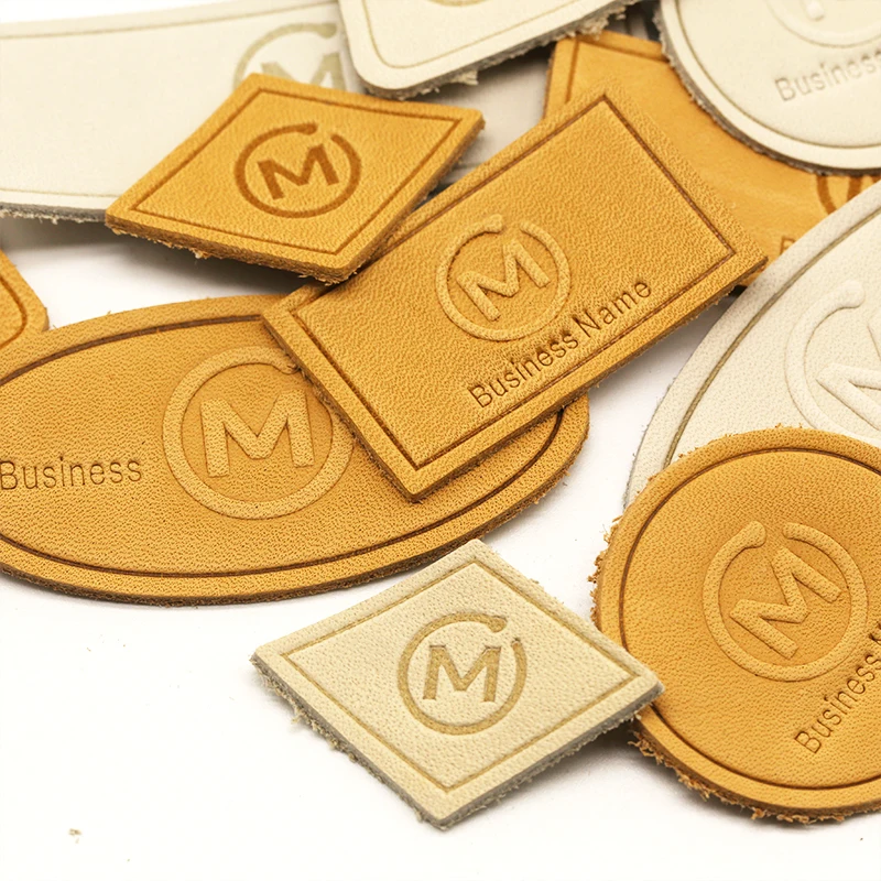 Best Price Custom Shape Embossed Brand Triangle Round Rectangle Clothing Tag Metal Casting Pu Leather Patches