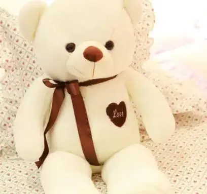 Beautiful texture of brown filled cotton cloth teddy bear smiley face to welcome