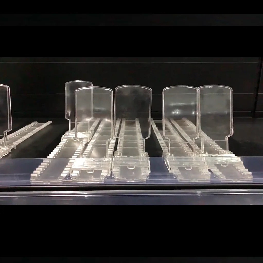 Wholesale plastic adjustable pusher shelf for cigarette display