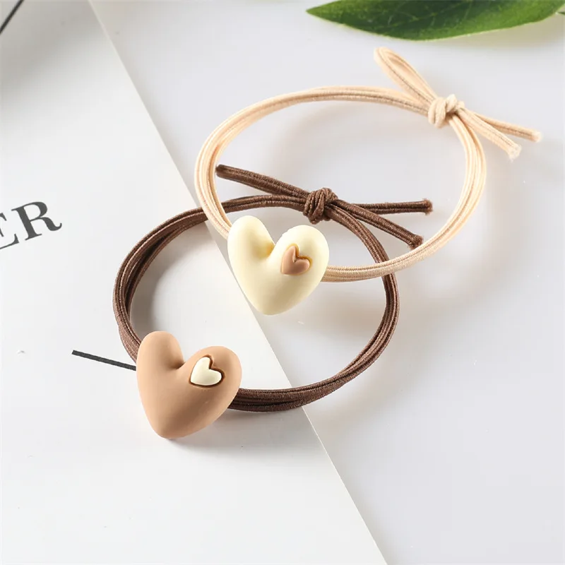 Korean version of popular peach heart milk tea color tie hair adult student hair circle heart-shaped elastic band