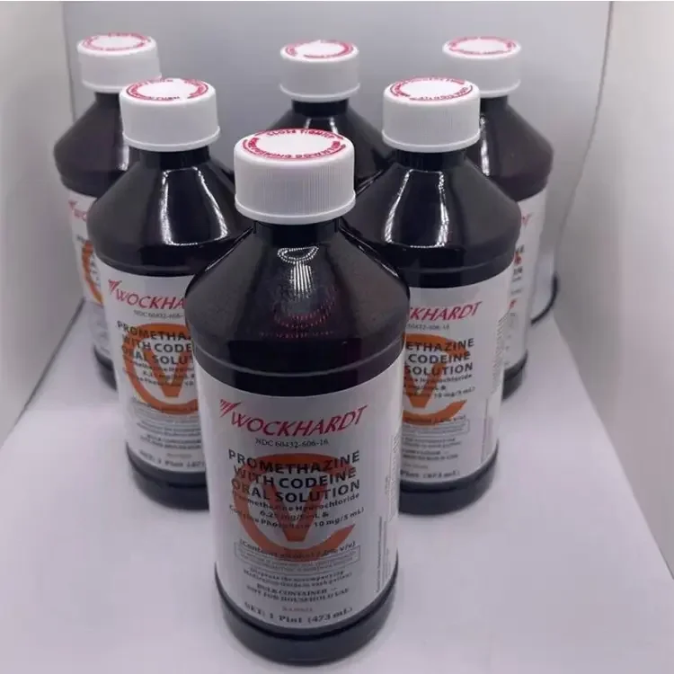 Фармацевтические бутылочки с сиропом от кашля Wockhardt янтарным пластиковым насосом на 16 унций этикеткой и красной крышкой для письма