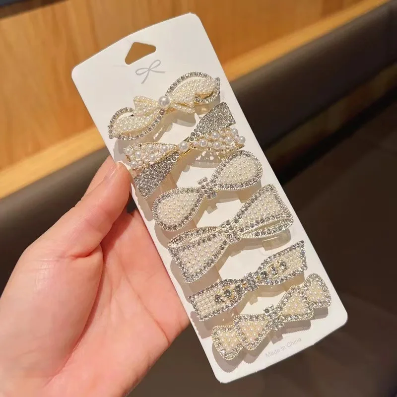 Korea Small Metal Bow Spring Clip Women Elegant Pearl Rhinestone Hollow Hairpin Temperament Half Tie Hair Clip