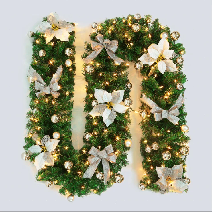 Wholesale Christmas flower bowknot decorated led pre lit artificial christmas garland