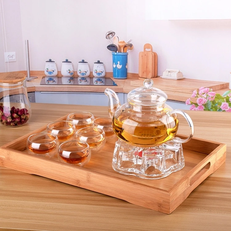 
Borosilicate Gongfu Tea Flowering Glass Teapot Set with 6 cups and pot warmer 