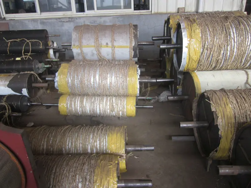 Textile waste recycling machine various types of machines used in openers and spring cleaners Take-up roll with rack