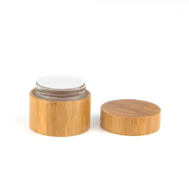 Manufacturer 30ml 50ml 100g 200g 250g Custom Glass Jar Wooden Lid Logo Engraving Jar Lids Bamboo Lid Cosmetic Jar
