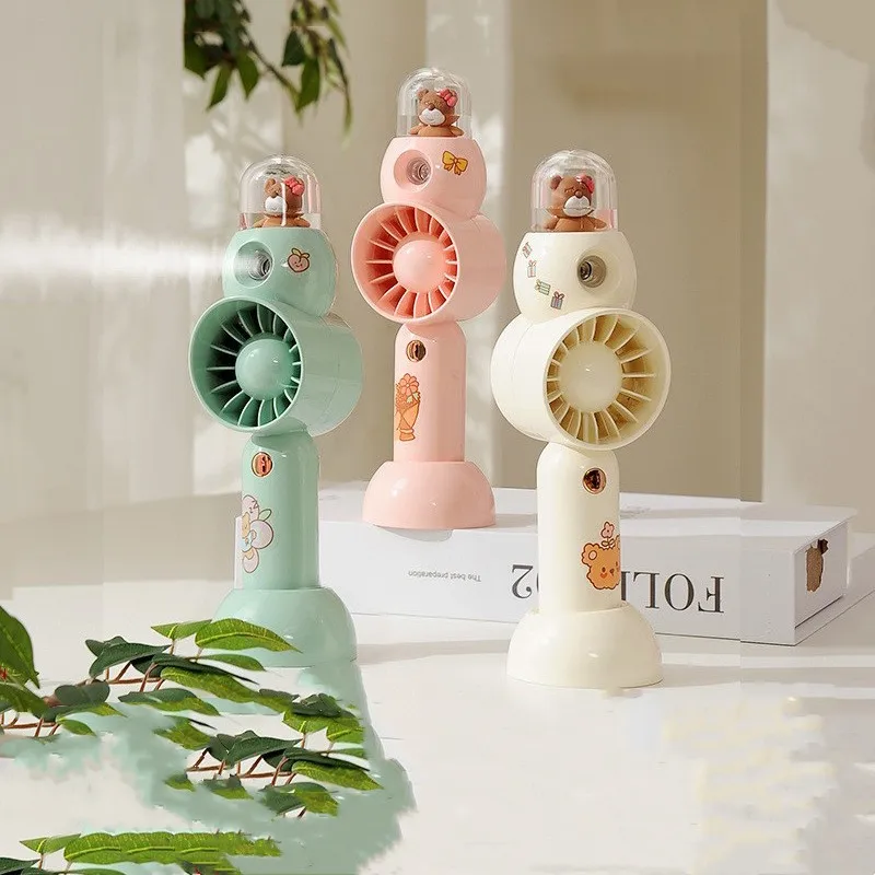 New handheld spray fan USB charging desktop electric fan portable mini small fan gift wholesale