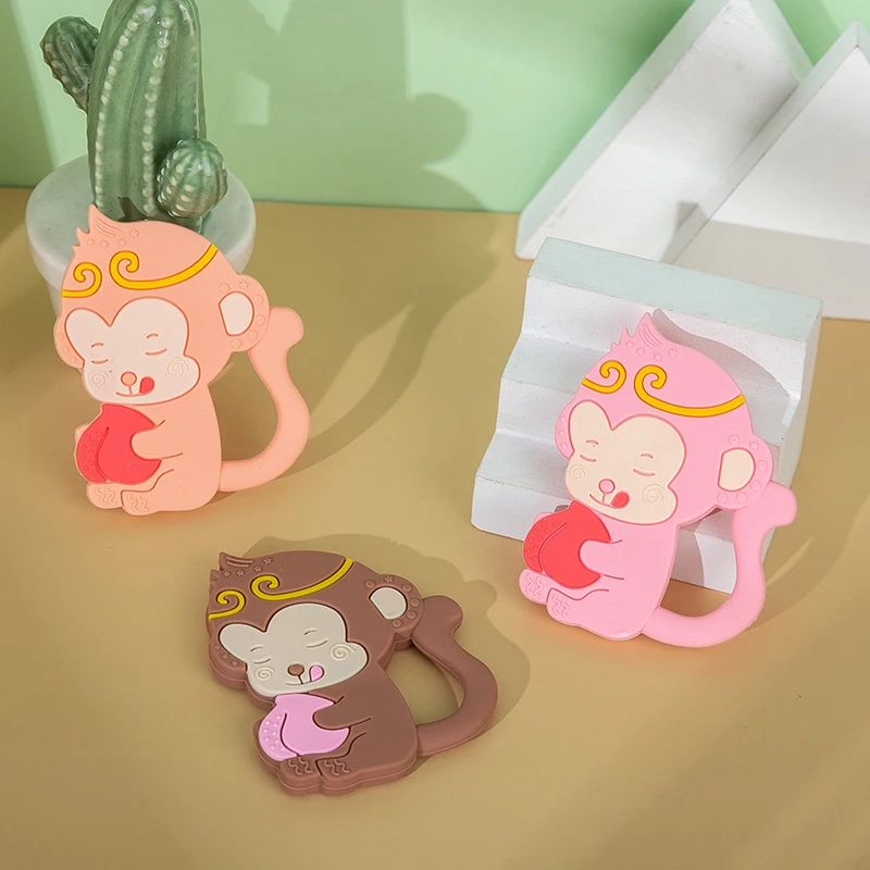 Wholesale OEM BPA free Monkey shaped Baby teeth grinding stick toy food grade comfort toy baby silicone dental gel