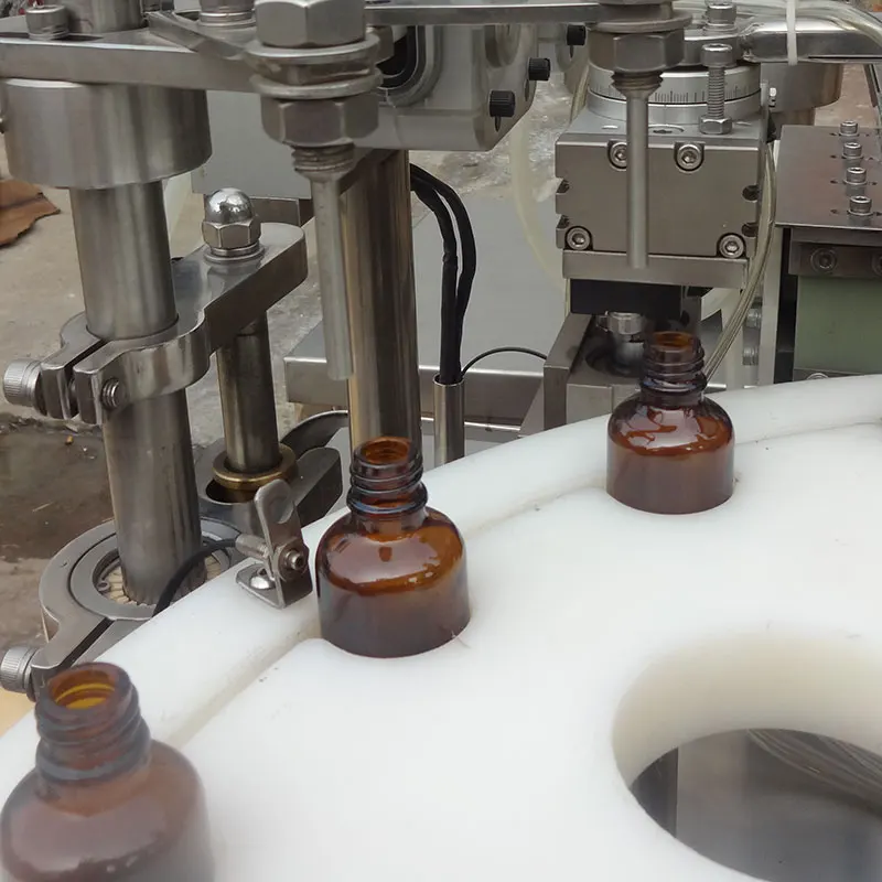  Fast shipping CBD oil/ hemp seed vape juice glass dropper bottle filling capping machine e cigarette oil filler and