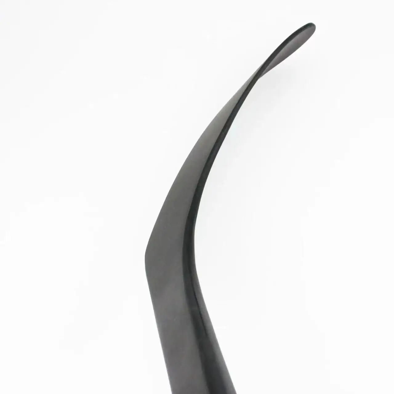 Low - cost eco - friendly goalie ice hockey stick for innovative ice field ball games.