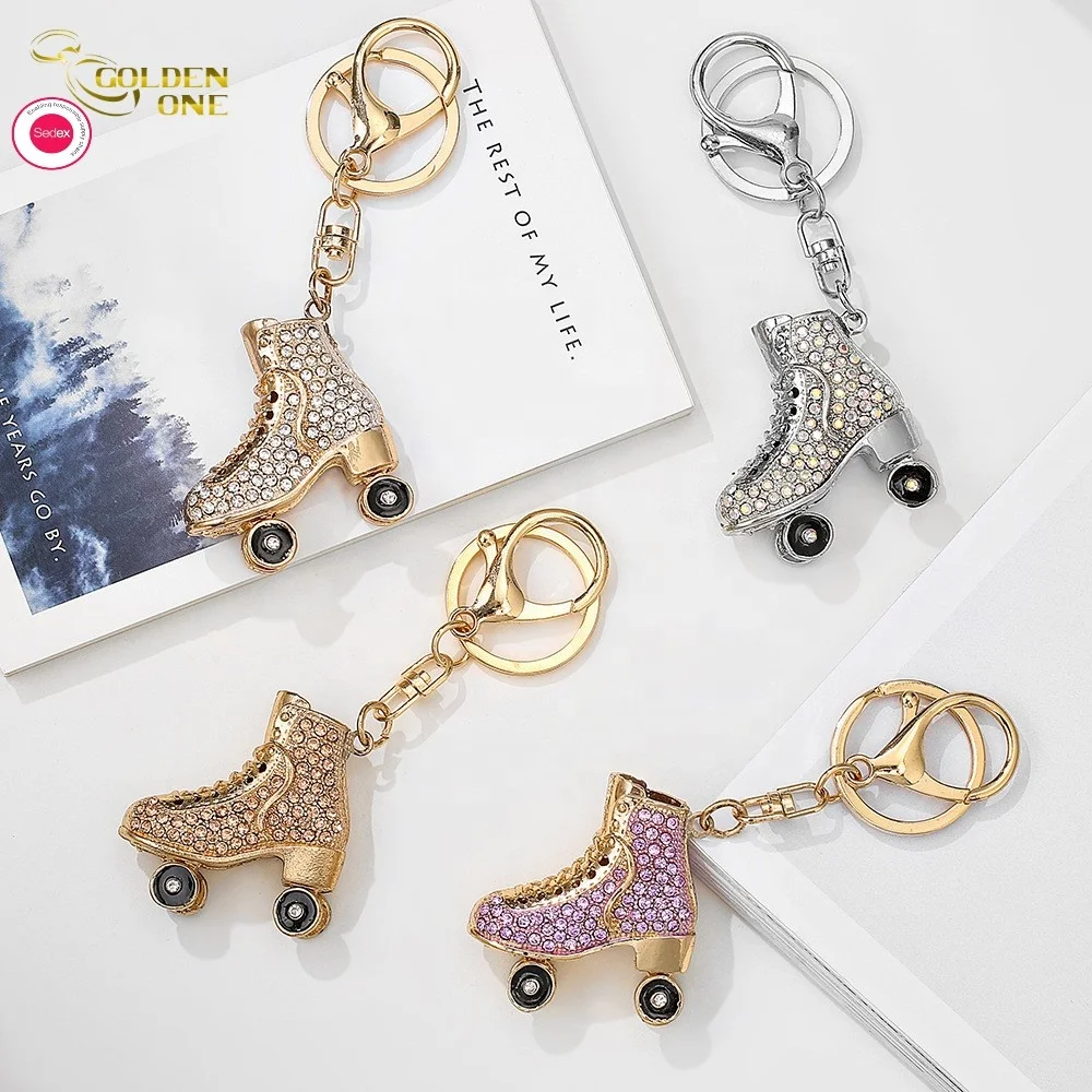 Amazon wholesale metal  pendant luminous unique Roller skates fashion diamond small gift creative keychain for Sweater chain