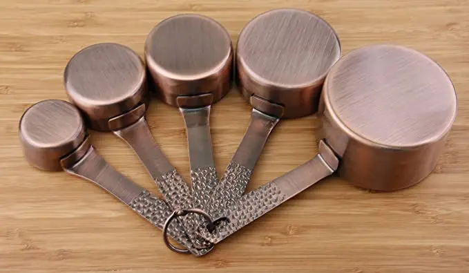  Set of 11 copper-plated stainless steel measuring cups and spoons 5 6 colored