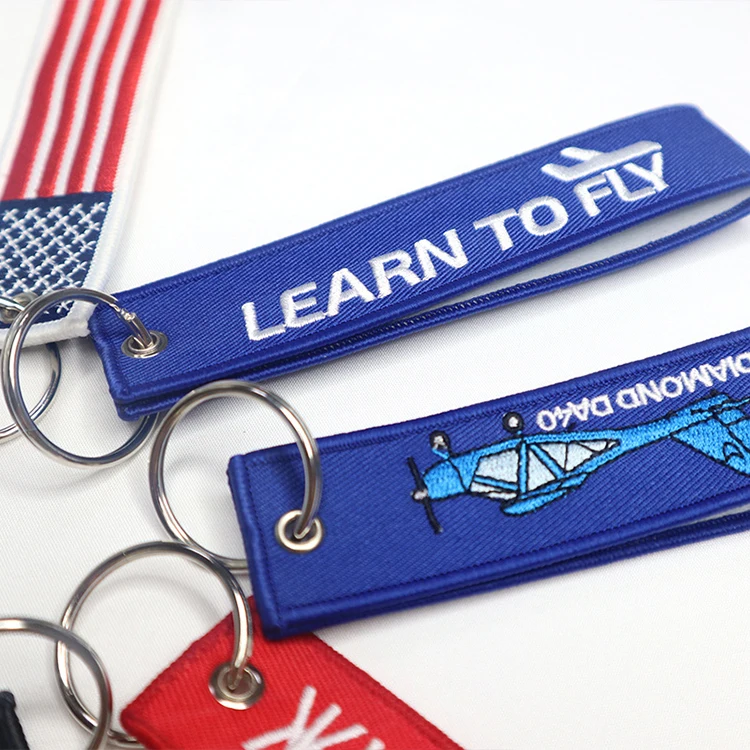 Polyester fabric edge wrapped keychain embroidered letter logo woven belt keychain minimalist gift pendant