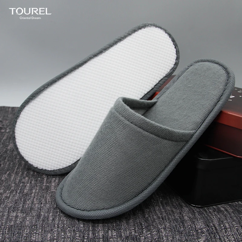 OEM Custom Logo luxury hotel room amenities slippers manufacturer modern design plain nap cloth shoes disposable spa slippers