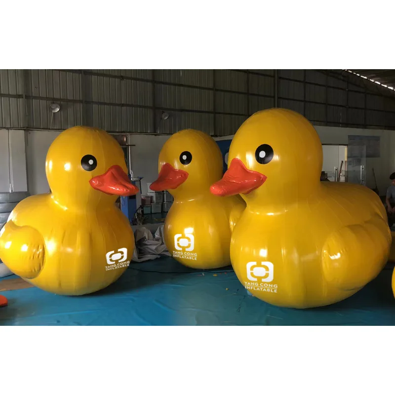 Advertising yellow giant inflatable duck inflatable rubber duck in the lake or land for propaganda
