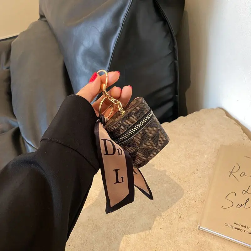 Wholesale Hot sale creative travel leather pendant keychain mini lipstick bag keychain fashion Headphone bag keychain with scarf