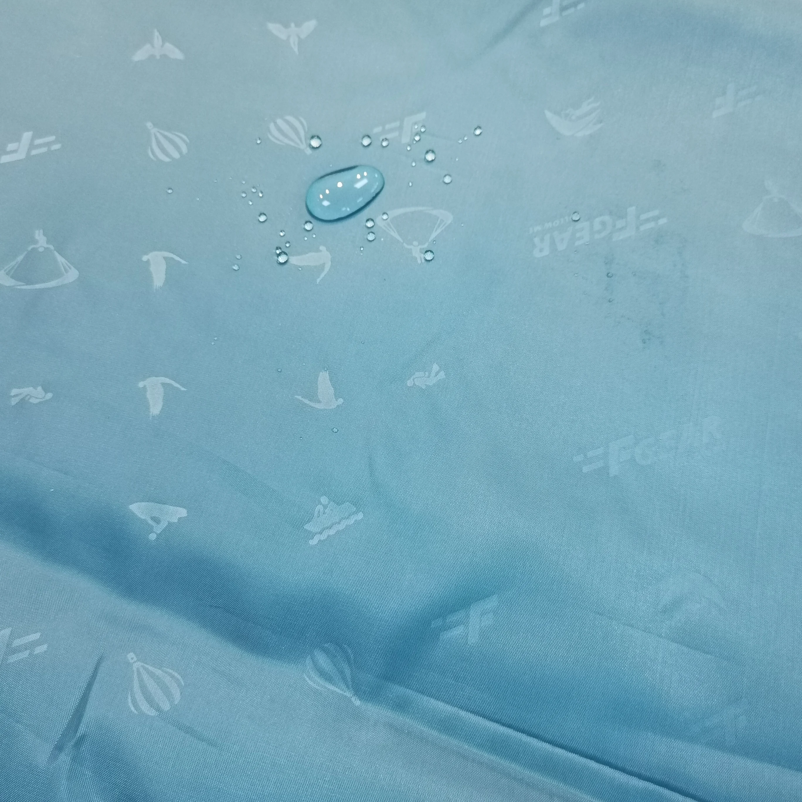 High quality woven jersey polyester jacquard with twill taffeta embossed red-crowned crane logo jacquard lining