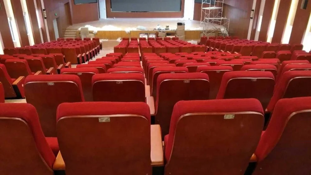 High quality fabric auditorium theatre chair,red color folding auditorium hall chair with writing pad