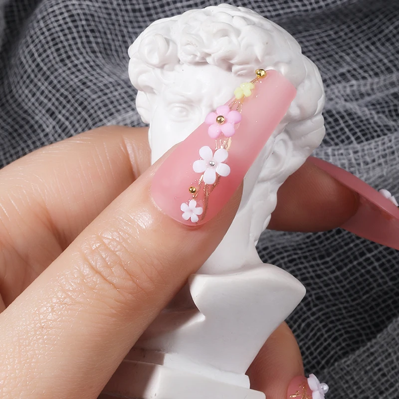 Hot sell mini resin five petal flower handmade nails small flower three-dimensional fingertip disc nail art nail art rhinestone