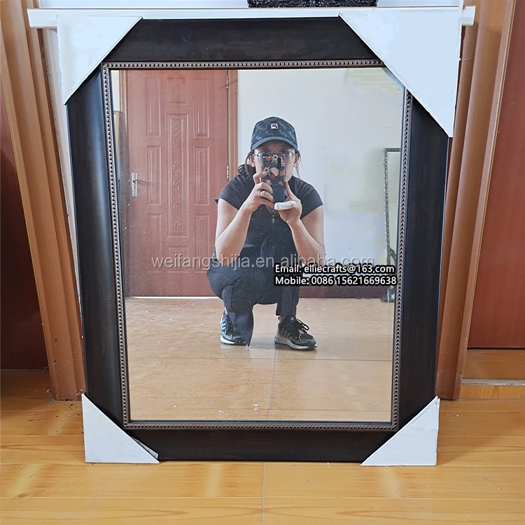 large PS framed mirror