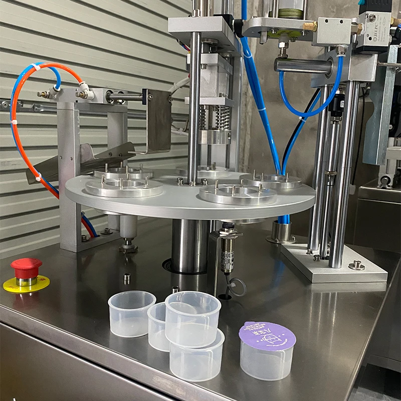 Vertical Automatic Continuous Rotary Packaging Food Mini Can Tea Cup Plastic Bottle K Cup Coffee Capsule Foil Sealing Machine