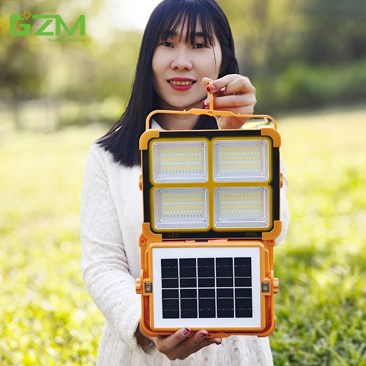 Hot Sale ABS IP67 Outdoor Mobile Power USB Output Charging 100 200 400 600 800 1000 watt Portable Solar Camping Flood Light
