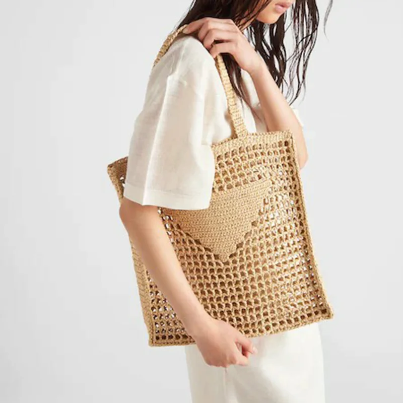 2023 brand mesh beach woven one-shoulder ladies handbag environmental protection paper rope grass hand woven bag